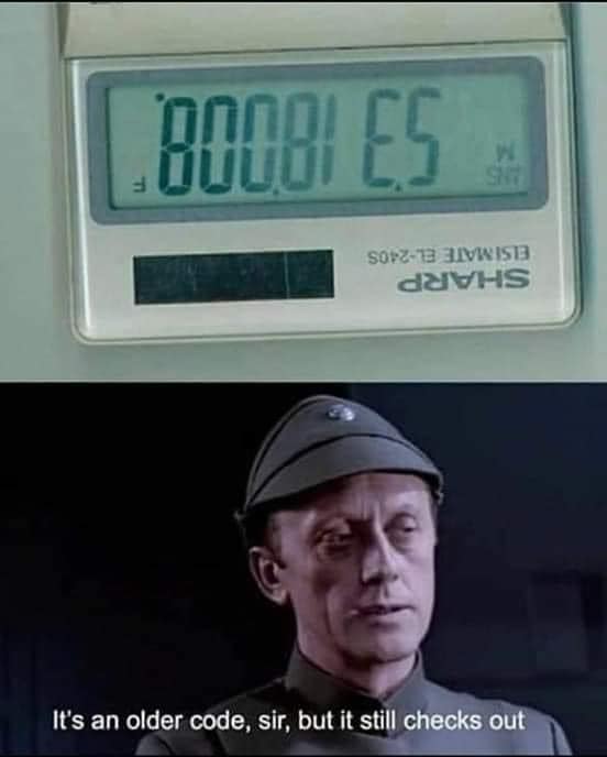 This meme is a screenshot of a character from the movie "Star Wars: The Force Awakens" (K-2SO, a reprogrammed Imperial droid) responding to a piece of code that looks like gibberish. The text overlay on the image reads: "It's an old code, but it still checks out." The meme is likely used to express skepticism or confusion when encountering unfamiliar or outdated technology.